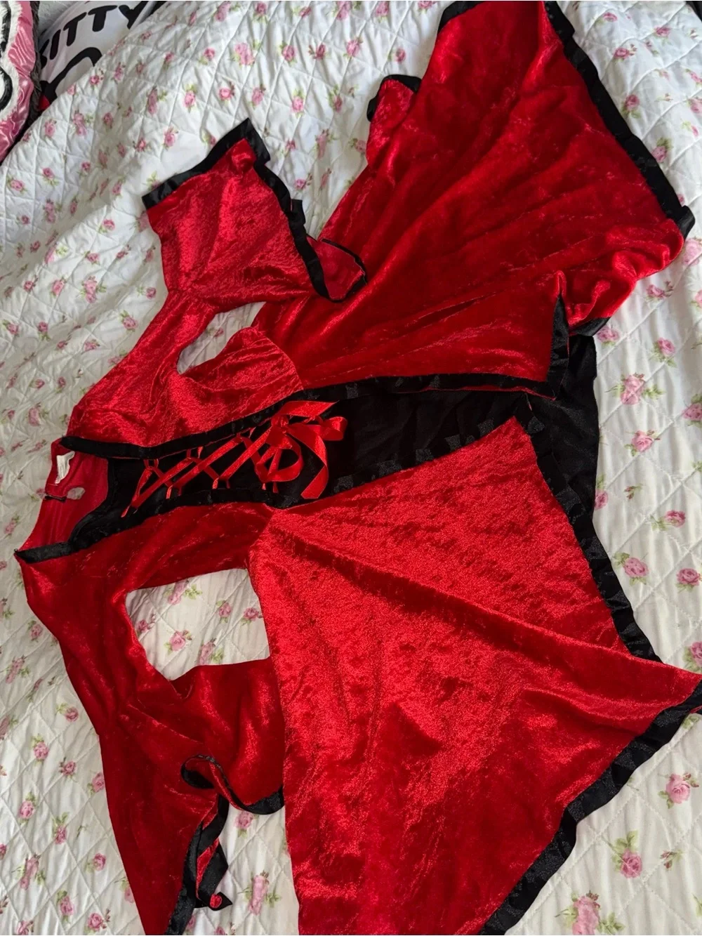 Red velvet dress with black trim and lace-up front, size L